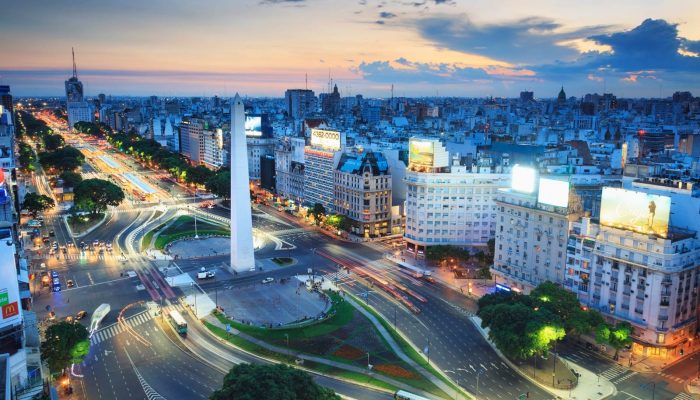 Argentina, Buenos Aires, Elevated view of Avenida 9 de Julio and Obelisk at sunset